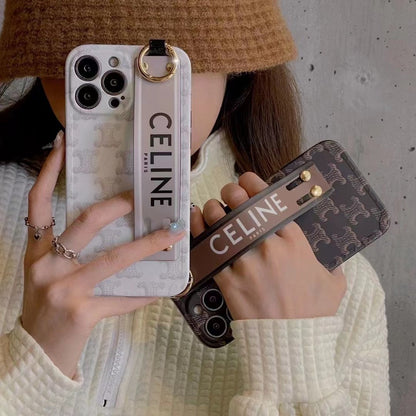 Modne etui na iPhone'a z opaską na nadgarstek